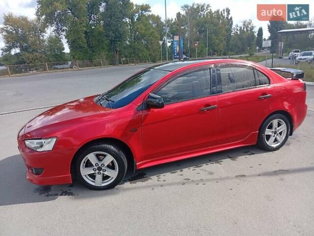 Червоний Міцубісі Lancer, об'ємом двигуна 2 л та пробігом 168 тис. км за 6800 $, фото 16 на Automoto.ua