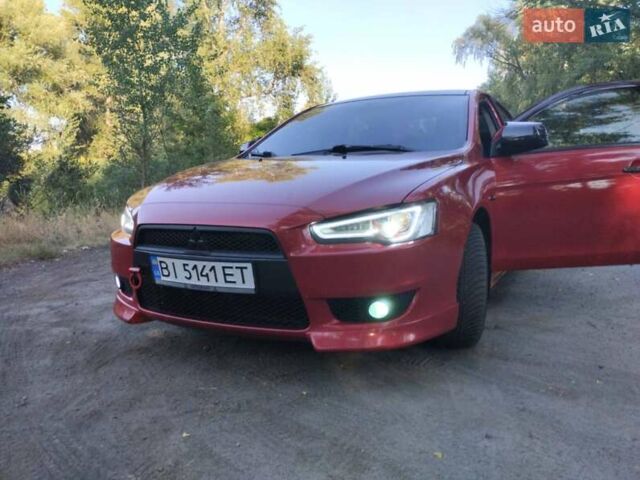 Червоний Міцубісі Lancer, об'ємом двигуна 2 л та пробігом 168 тис. км за 6800 $, фото 1 на Automoto.ua