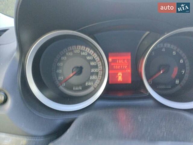 Червоний Міцубісі Lancer, об'ємом двигуна 2 л та пробігом 168 тис. км за 6800 $, фото 4 на Automoto.ua