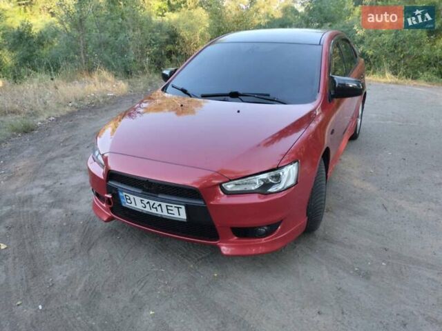 Червоний Міцубісі Lancer, об'ємом двигуна 2 л та пробігом 168 тис. км за 6800 $, фото 7 на Automoto.ua