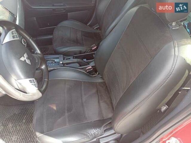 Червоний Міцубісі Lancer, об'ємом двигуна 2 л та пробігом 168 тис. км за 6800 $, фото 23 на Automoto.ua