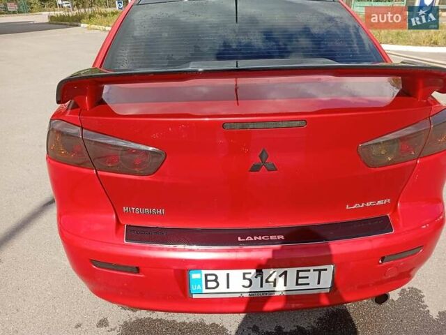 Червоний Міцубісі Lancer, об'ємом двигуна 2 л та пробігом 168 тис. км за 6800 $, фото 22 на Automoto.ua