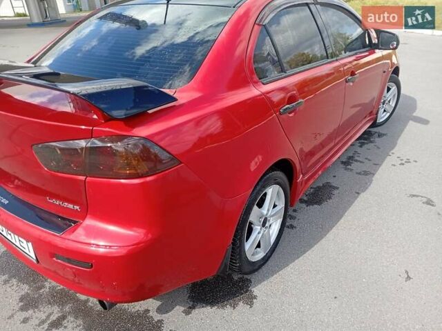 Червоний Міцубісі Lancer, об'ємом двигуна 2 л та пробігом 168 тис. км за 6800 $, фото 14 на Automoto.ua