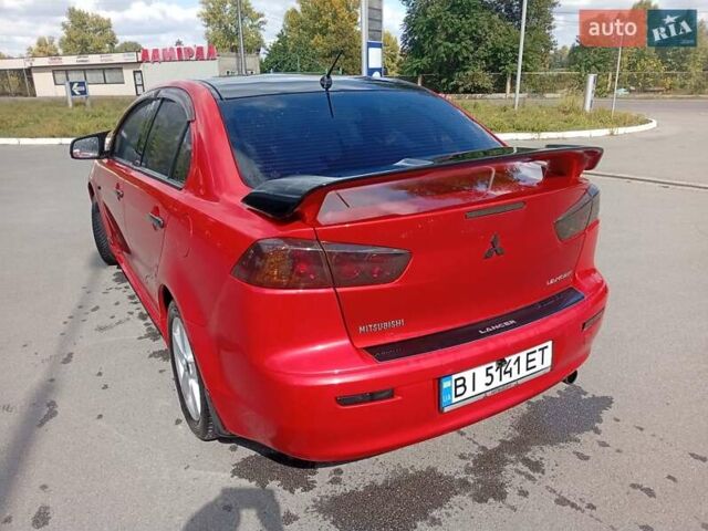Червоний Міцубісі Lancer, об'ємом двигуна 2 л та пробігом 168 тис. км за 6800 $, фото 15 на Automoto.ua