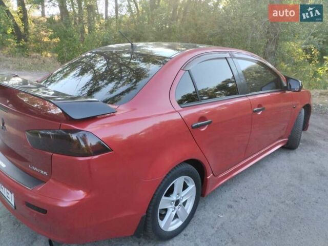 Червоний Міцубісі Lancer, об'ємом двигуна 2 л та пробігом 168 тис. км за 6800 $, фото 6 на Automoto.ua