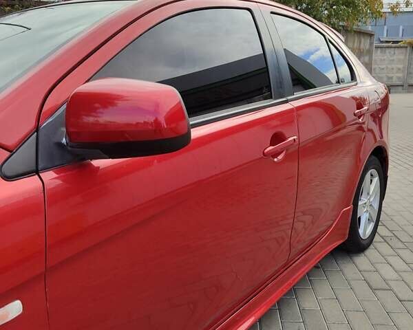 Мицубиси Лансер 2008 в Белой Церкве на Automoto.ua Красный Мицубиси Лансер, объемом двигателя 1.8 л и пробегом 200 тыс. км за 5100 $, фото 8 на Automoto.ua