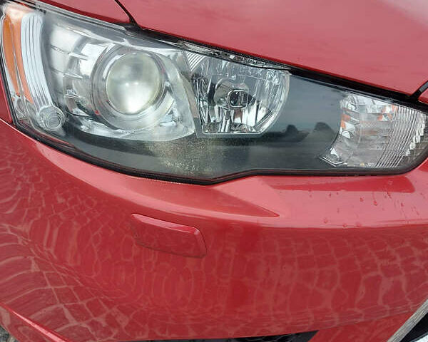 Червоний Міцубісі Lancer, об'ємом двигуна 2 л та пробігом 58 тис. км за 12900 $, фото 11 на Automoto.ua