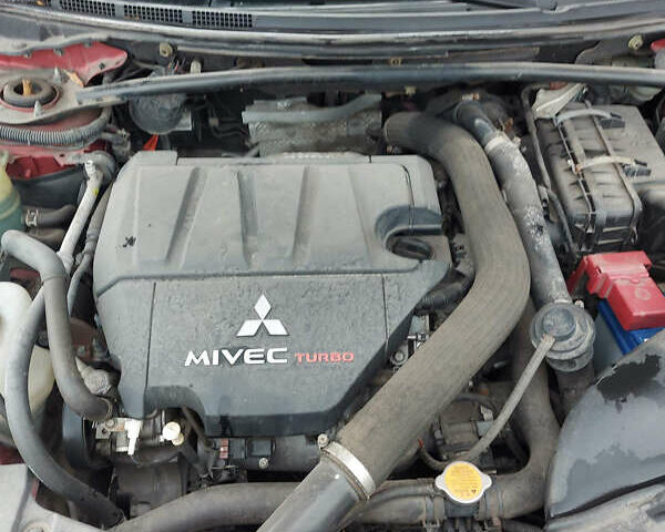 Червоний Міцубісі Lancer, об'ємом двигуна 2 л та пробігом 58 тис. км за 12900 $, фото 12 на Automoto.ua