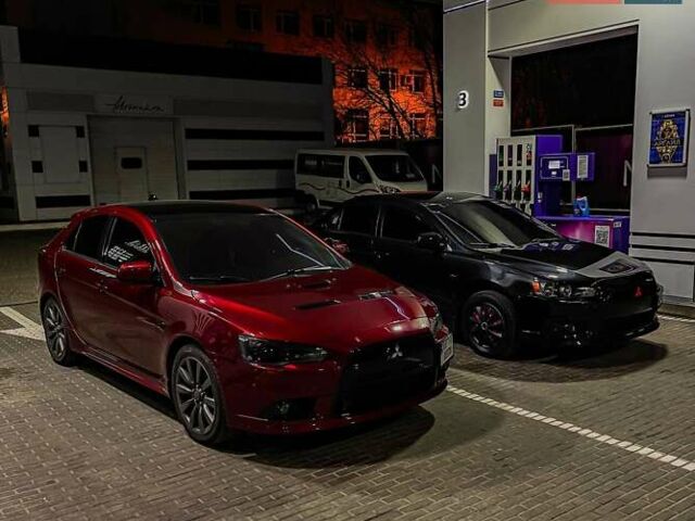 Красный Мицубиси Лансер, объемом двигателя 2 л и пробегом 128 тыс. км за 14700 $, фото 14 на Automoto.ua