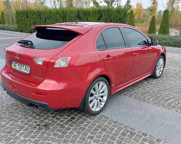 Червоний Міцубісі Lancer, об'ємом двигуна 2 л та пробігом 58 тис. км за 12900 $, фото 6 на Automoto.ua