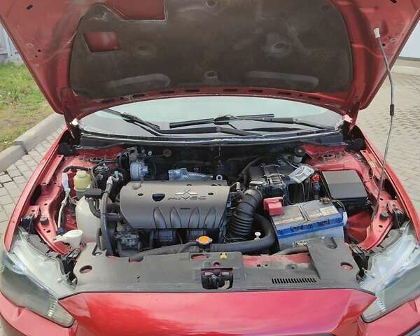 Мицубиси Лансер 2008 в Белой Церкве на Automoto.ua Красный Мицубиси Лансер, объемом двигателя 1.8 л и пробегом 200 тыс. км за 5100 $, фото 4 на Automoto.ua