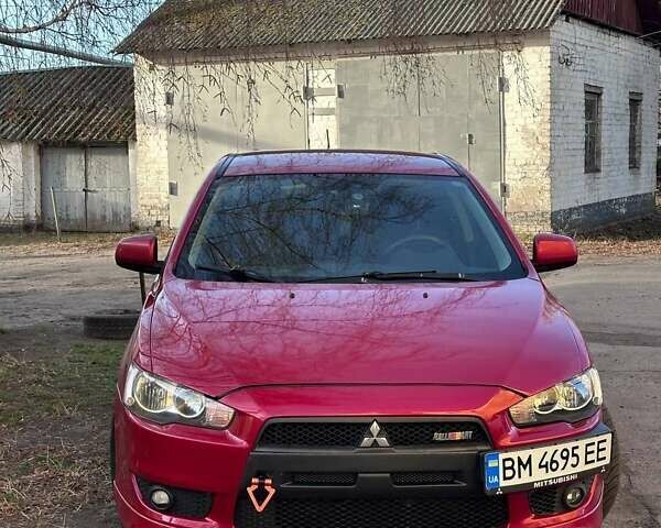 Красный Мицубиси Лансер, объемом двигателя 1.6 л и пробегом 300 тыс. км за 7000 $, фото 1 на Automoto.ua