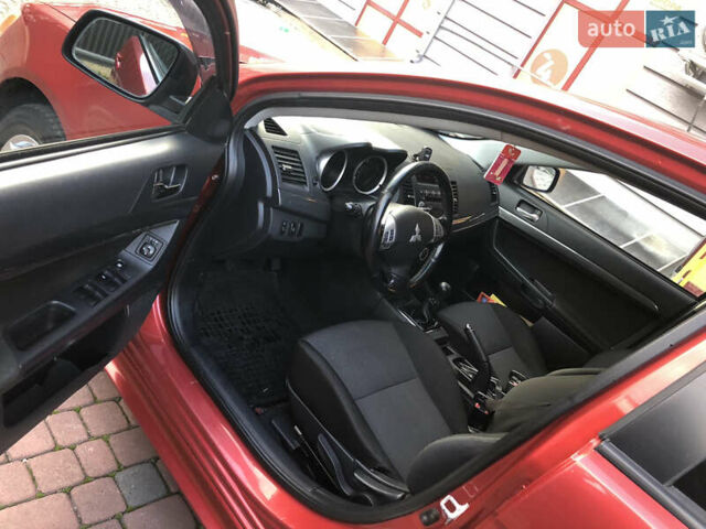 Мицубиси Лансер 2008 в Ивано-Франковске на Automoto.ua Красный Мицубиси Лансер, объемом двигателя 1.8 л и пробегом 180 тыс. км за 5400 $, фото 16 на Automoto.ua