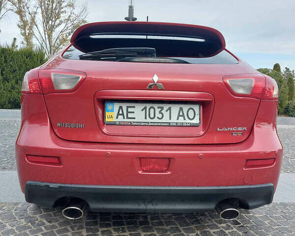 Червоний Міцубісі Lancer, об'ємом двигуна 2 л та пробігом 58 тис. км за 12900 $, фото 5 на Automoto.ua