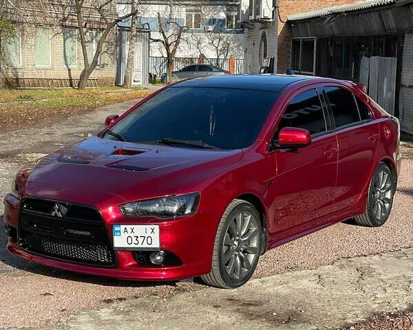 Красный Мицубиси Лансер, объемом двигателя 2 л и пробегом 128 тыс. км за 14700 $, фото 9 на Automoto.ua