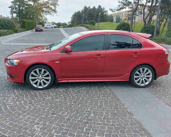 Червоний Міцубісі Lancer, об'ємом двигуна 2 л та пробігом 58 тис. км за 12900 $, фото 4 на Automoto.ua