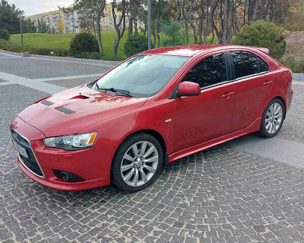 Червоний Міцубісі Lancer, об'ємом двигуна 2 л та пробігом 58 тис. км за 12900 $, фото 3 на Automoto.ua
