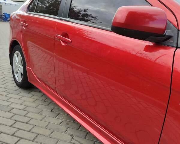 Мицубиси Лансер 2008 в Белой Церкве на Automoto.ua Красный Мицубиси Лансер, объемом двигателя 1.8 л и пробегом 200 тыс. км за 5100 $, фото 6 на Automoto.ua