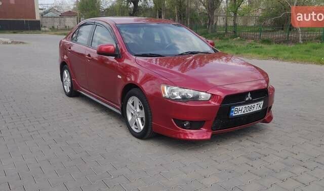 Червоний Міцубісі Lancer, об'ємом двигуна 1.8 л та пробігом 78 тис. км за 7800 $, фото 9 на Automoto.ua