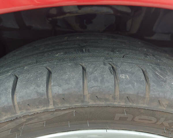 Червоний Міцубісі Lancer, об'ємом двигуна 2 л та пробігом 58 тис. км за 12900 $, фото 7 на Automoto.ua