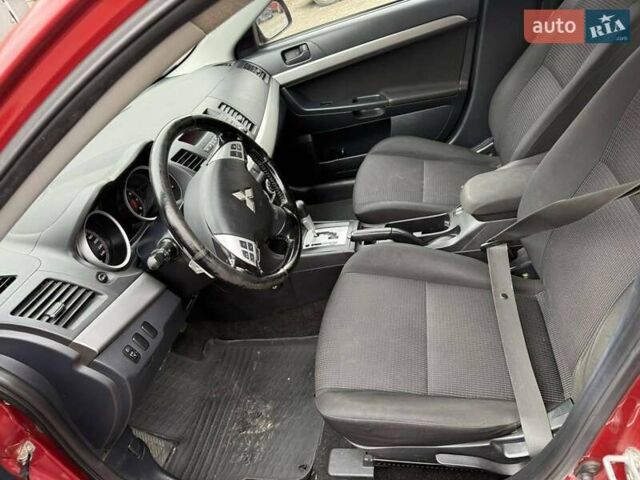 Червоний Міцубісі Lancer, об'ємом двигуна 1.8 л та пробігом 168 тис. км за 5600 $, фото 6 на Automoto.ua