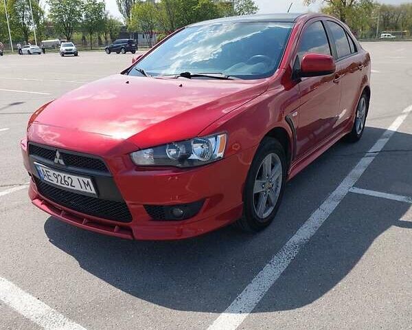 Мицубиси Лансер 2009 в Днепре (Днепропетровске) на Automoto.ua Красный Мицубиси Лансер, объемом двигателя 1.8 л и пробегом 177 тыс. км за 6800 $, фото 2 на Automoto.ua
