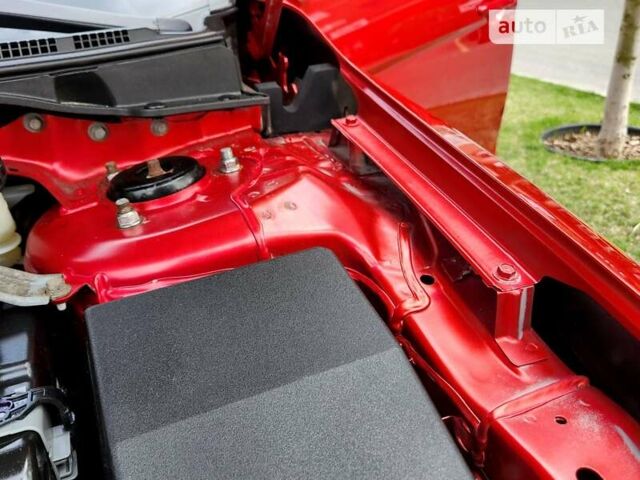 Червоний Міцубісі Lancer, об'ємом двигуна 1.8 л та пробігом 116 тис. км за 9350 $, фото 49 на Automoto.ua