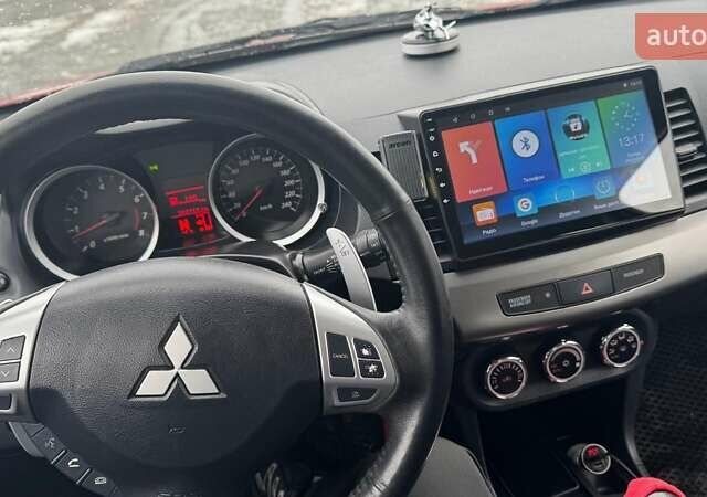 Красный Мицубиси Лансер, объемом двигателя 1.8 л и пробегом 282 тыс. км за 9300 $, фото 33 на Automoto.ua