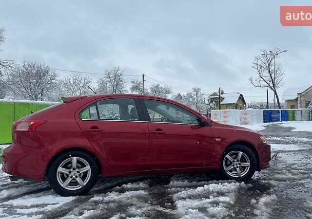 Красный Мицубиси Лансер, объемом двигателя 1.8 л и пробегом 282 тыс. км за 9300 $, фото 4 на Automoto.ua