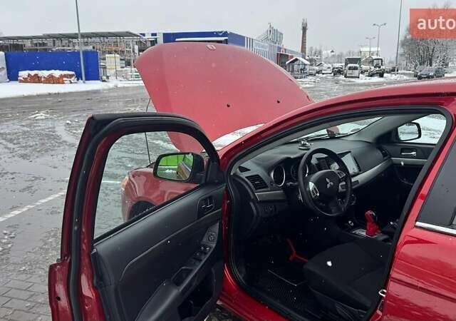 Красный Мицубиси Лансер, объемом двигателя 1.8 л и пробегом 282 тыс. км за 9300 $, фото 34 на Automoto.ua