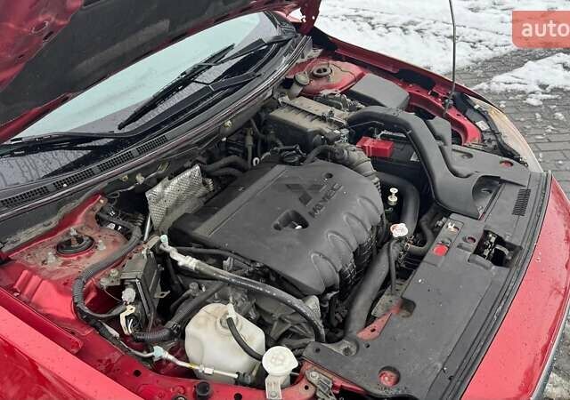 Красный Мицубиси Лансер, объемом двигателя 1.8 л и пробегом 282 тыс. км за 9300 $, фото 15 на Automoto.ua