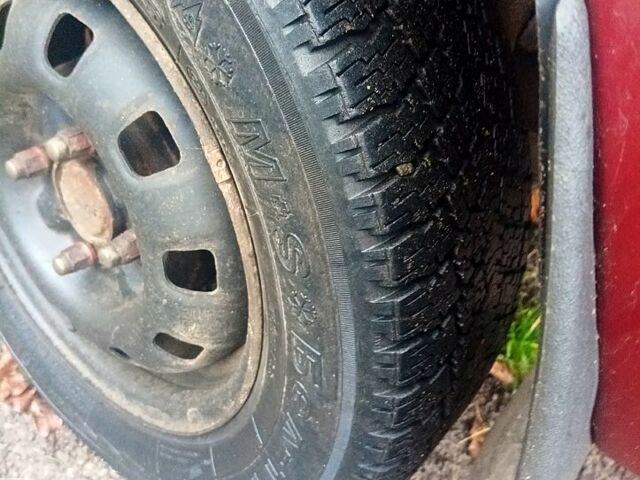 Красный Мицубиси Лансер, объемом двигателя 1.5 л и пробегом 310 тыс. км за 600 $, фото 6 на Automoto.ua