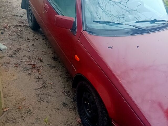 Красный Мицубиси Лансер, объемом двигателя 1.5 л и пробегом 310 тыс. км за 600 $, фото 3 на Automoto.ua