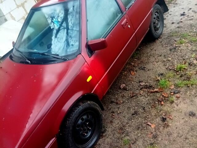 Красный Мицубиси Лансер, объемом двигателя 1.5 л и пробегом 310 тыс. км за 600 $, фото 5 на Automoto.ua