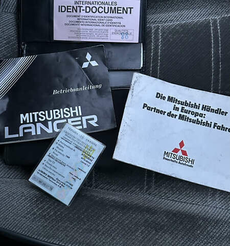 Червоний Міцубісі Lancer, об'ємом двигуна 1.5 л та пробігом 326 тис. км за 800 $, фото 13 на Automoto.ua