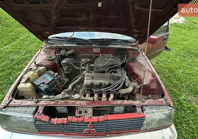 Червоний Міцубісі Lancer, об'ємом двигуна 1.5 л та пробігом 326 тис. км за 800 $, фото 8 на Automoto.ua