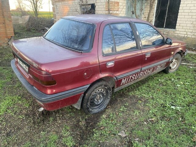Красный Мицубиси Лансер, объемом двигателя 0 л и пробегом 200 тыс. км за 355 $, фото 2 на Automoto.ua