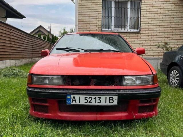 Червоний Міцубісі Lancer, об'ємом двигуна 1.8 л та пробігом 435 тис. км за 850 $, фото 1 на Automoto.ua