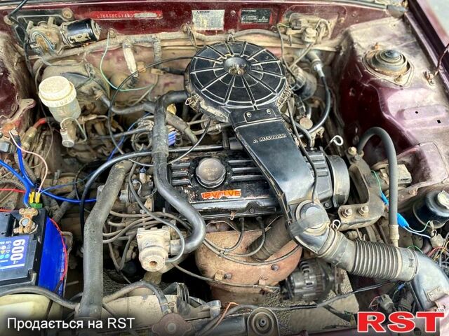 Красный Мицубиси Лансер, объемом двигателя 1.2 л и пробегом 420 тыс. км за 1900 $, фото 5 на Automoto.ua