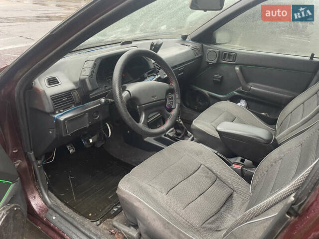 Красный Мицубиси Лансер, объемом двигателя 1.2 л и пробегом 220 тыс. км за 1300 $, фото 7 на Automoto.ua