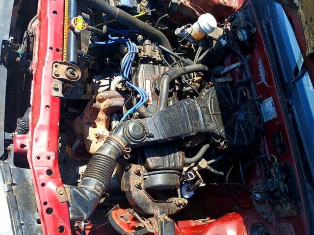 Червоний Міцубісі Lancer, об'ємом двигуна 1.3 л та пробігом 370 тис. км за 1100 $, фото 1 на Automoto.ua