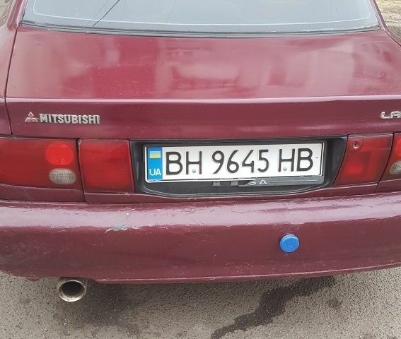 Красный Мицубиси Лансер, объемом двигателя 1.6 л и пробегом 362 тыс. км за 1700 $, фото 2 на Automoto.ua