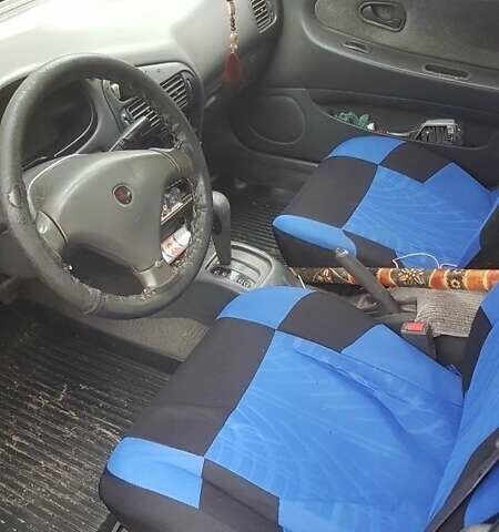 Красный Мицубиси Лансер, объемом двигателя 1.6 л и пробегом 362 тыс. км за 1700 $, фото 5 на Automoto.ua