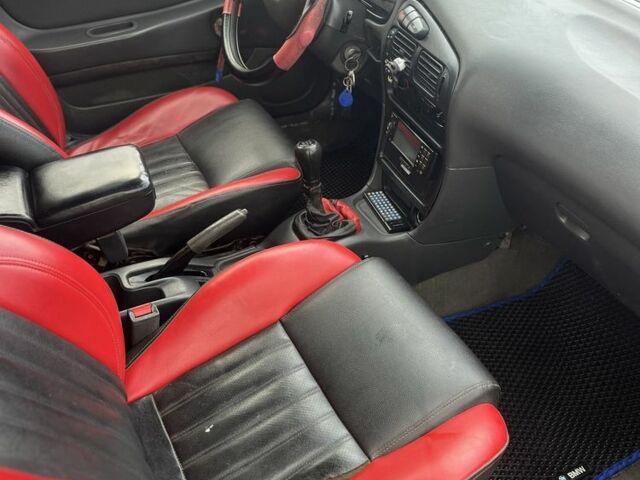 Червоний Міцубісі Lancer, об'ємом двигуна 1.3 л та пробігом 390 тис. км за 1500 $, фото 2 на Automoto.ua