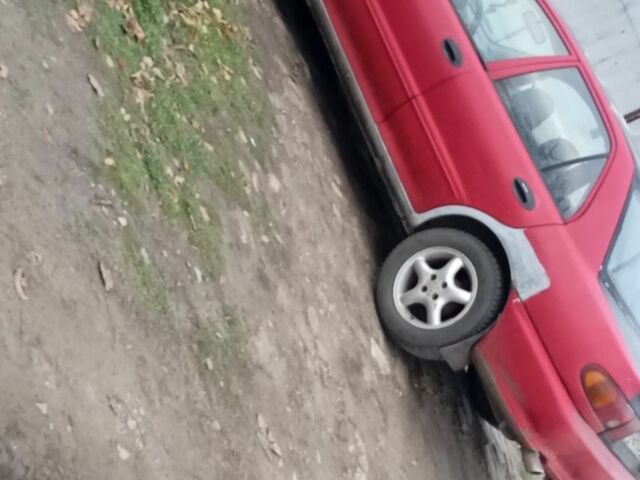 Красный Мицубиси Лансер, объемом двигателя 6 л и пробегом 1 тыс. км за 1200 $, фото 4 на Automoto.ua