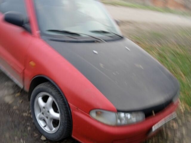 Красный Мицубиси Лансер, объемом двигателя 6 л и пробегом 1 тыс. км за 1200 $, фото 1 на Automoto.ua