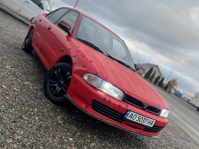 Червоний Міцубісі Lancer, об'ємом двигуна 1.3 л та пробігом 390 тис. км за 1500 $, фото 1 на Automoto.ua
