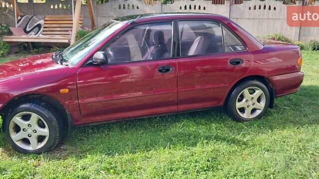 Червоний Міцубісі Lancer, об'ємом двигуна 1.3 л та пробігом 420 тис. км за 1900 $, фото 3 на Automoto.ua
