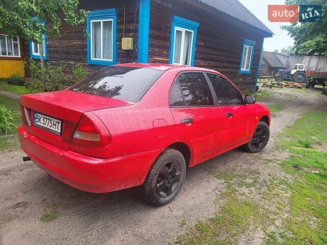 Червоний Міцубісі Lancer, об'ємом двигуна 1.3 л та пробігом 350 тис. км за 2500 $, фото 1 на Automoto.ua