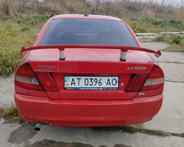 Червоний Міцубісі Lancer, об'ємом двигуна 1.3 л та пробігом 290 тис. км за 750 $, фото 2 на Automoto.ua